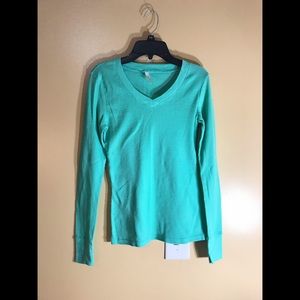 Teal/green long sleeve shirt and warm fit material